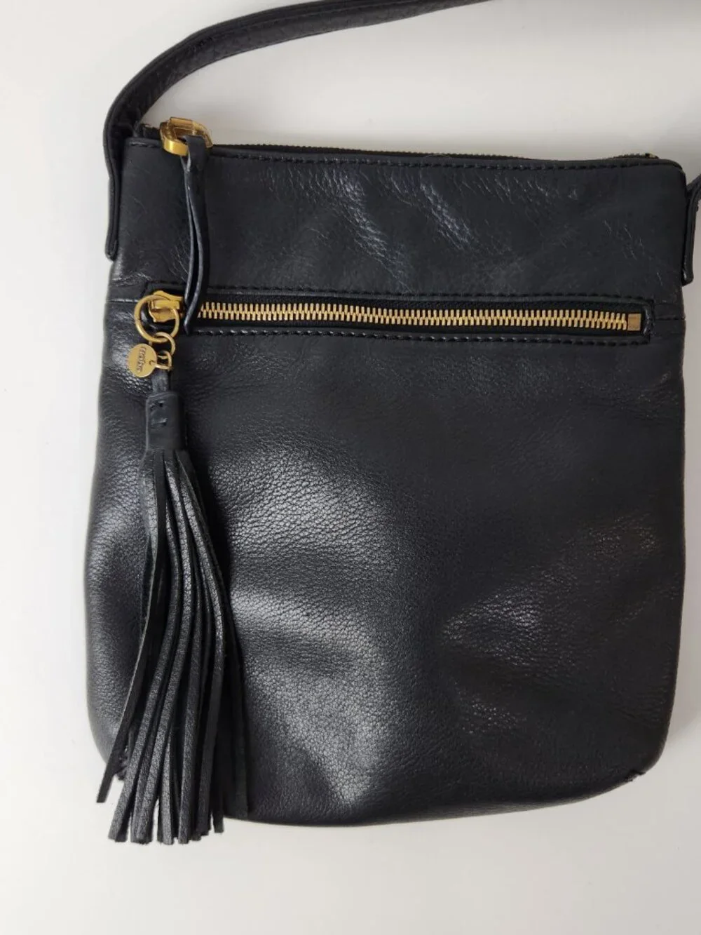 Hobo Crossbody Bag Black Pebbled Leather Tasseled Charm Soft Travel